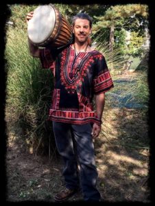 A man holding a drum